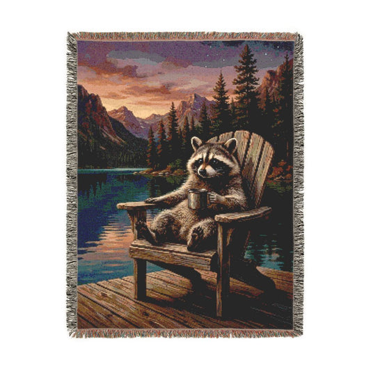 Lakeside Raccoon Woven Blanket, a 60 x 80 inch woven cotton throw blanket with fringed edges