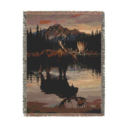 Moose at Dusk Woven Blanket, a 60 x 80 inch woven cotton throw blanket with fringed edges